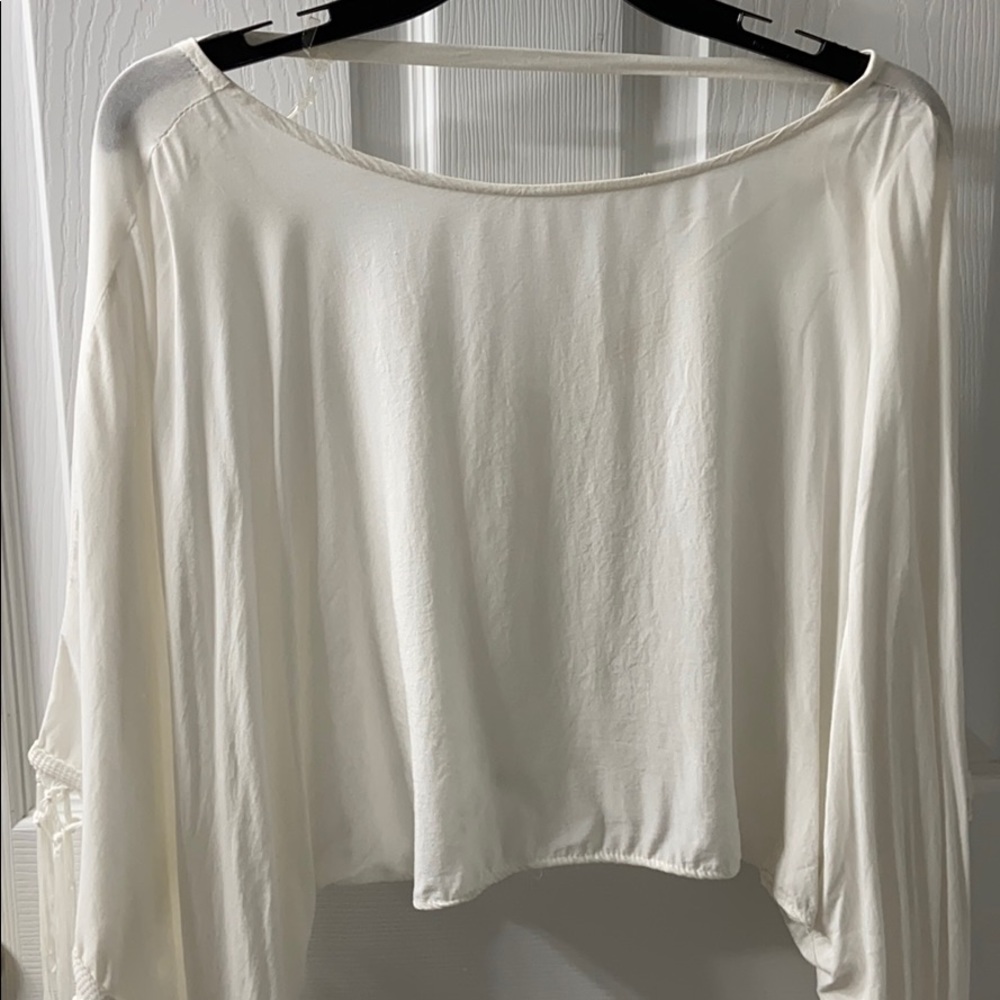 White crop with tassel sleeves